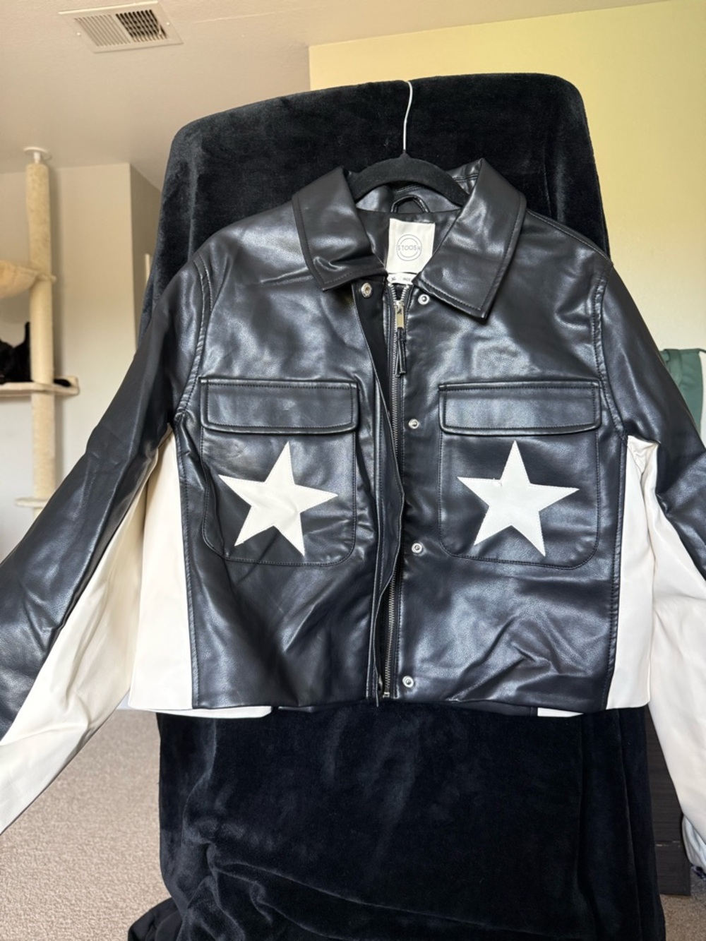 Black Leather Jacket with White Star Patches